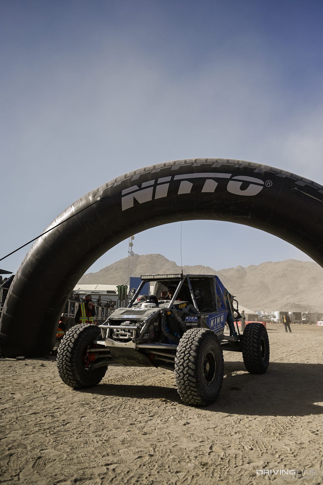 Raul Gomez at the finish line Nitto tire arch at the 2023 KOH Nitto Race of Kings