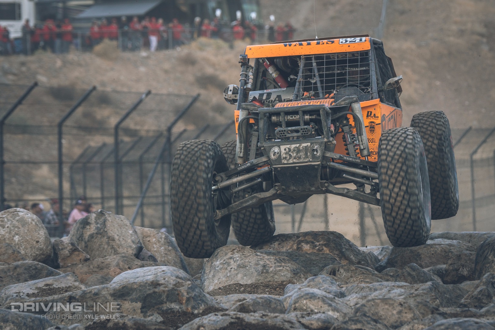 Tom Wayes charging across the rock garden