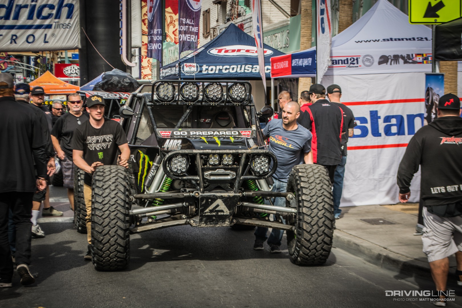 Campbells pushing their car through contingency