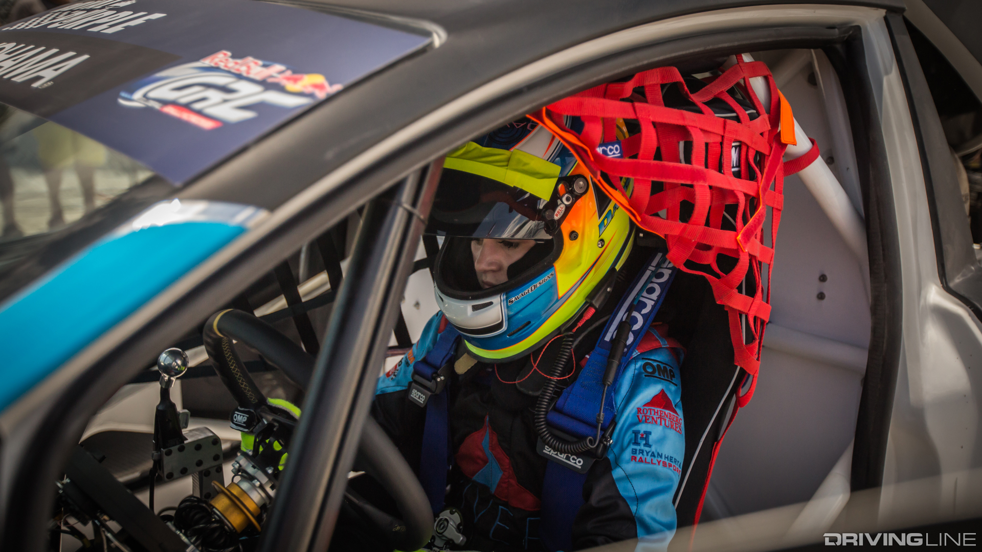 Collete Davis in racecar ready to race