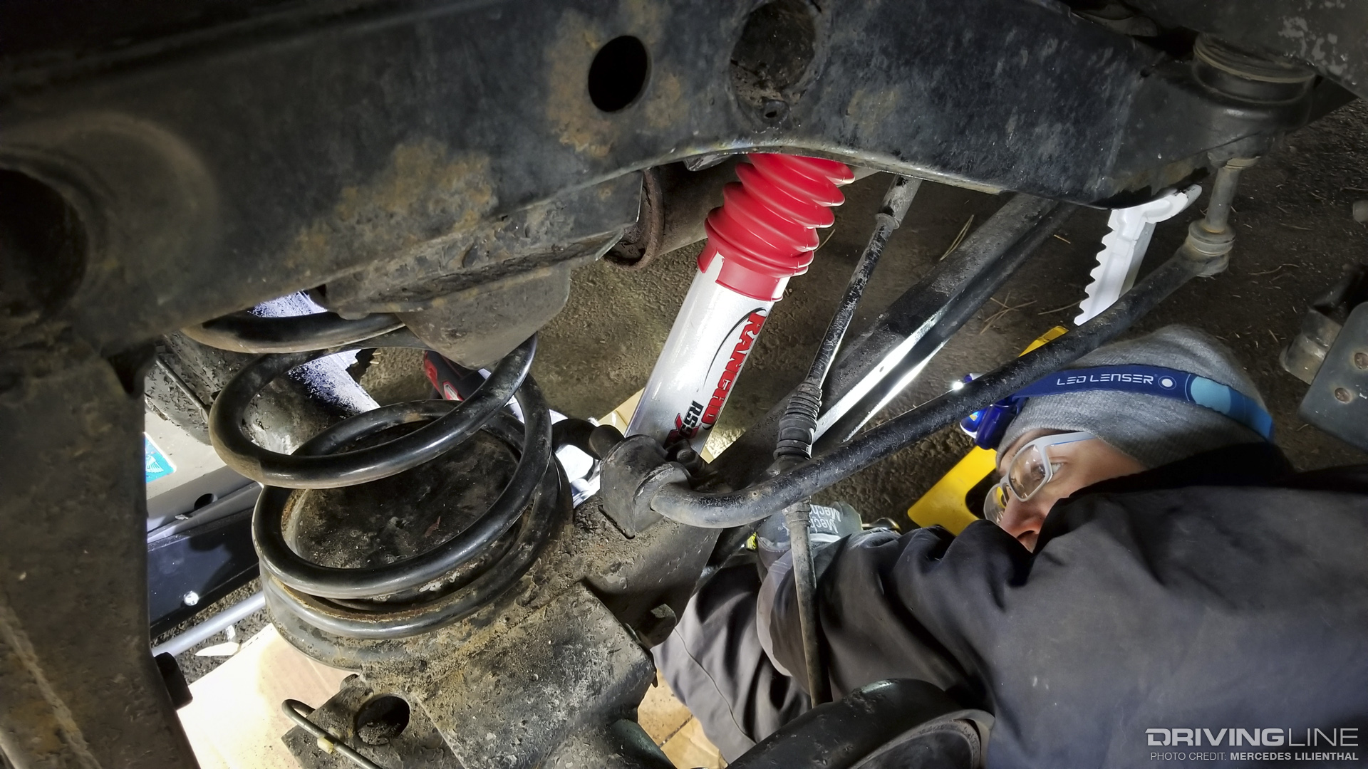 Andy Lilienthal tightening lower shock bolt