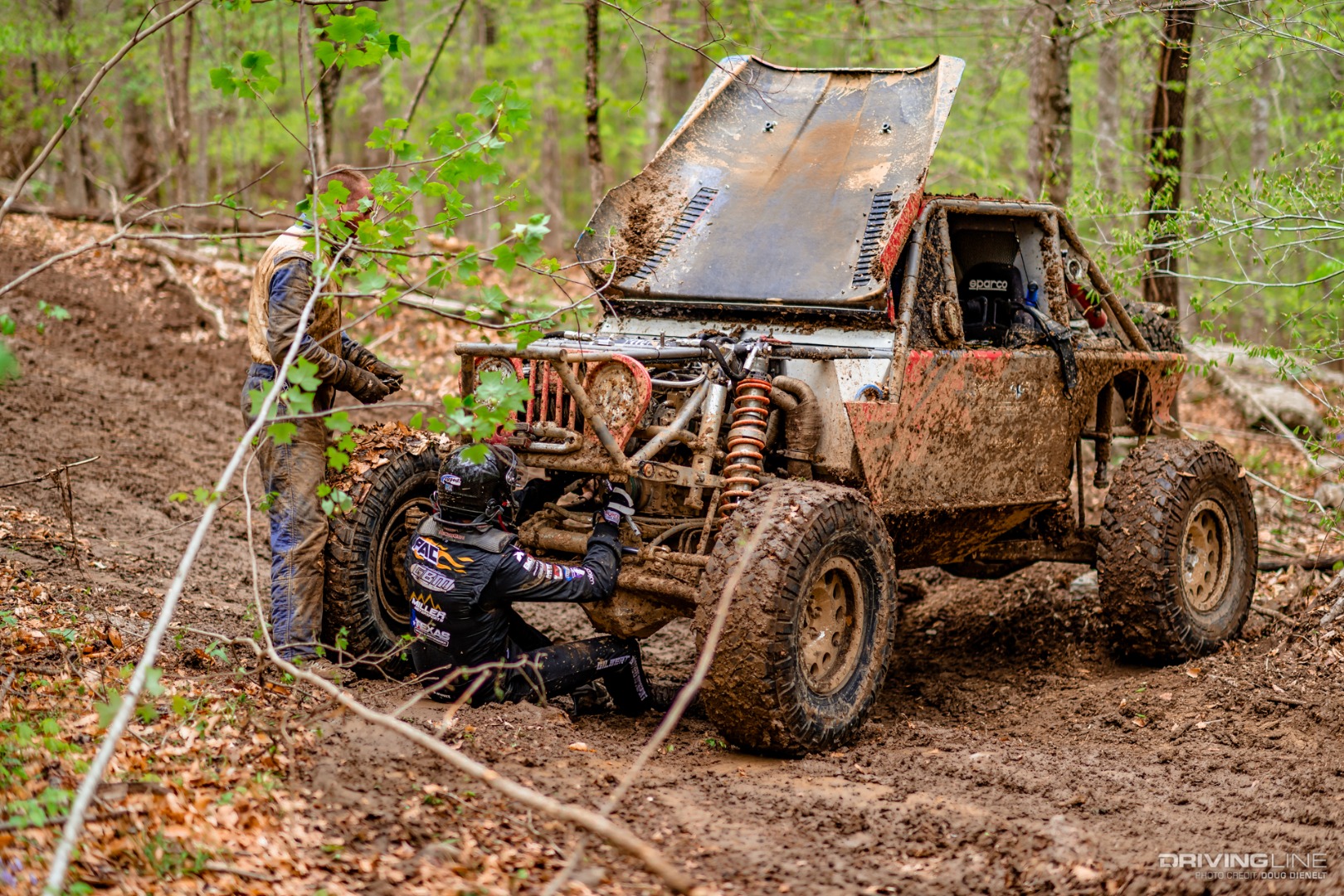 Casey Gilbert Inspecting His Vehicle at the Ultra4 Tear Down in Tennessee