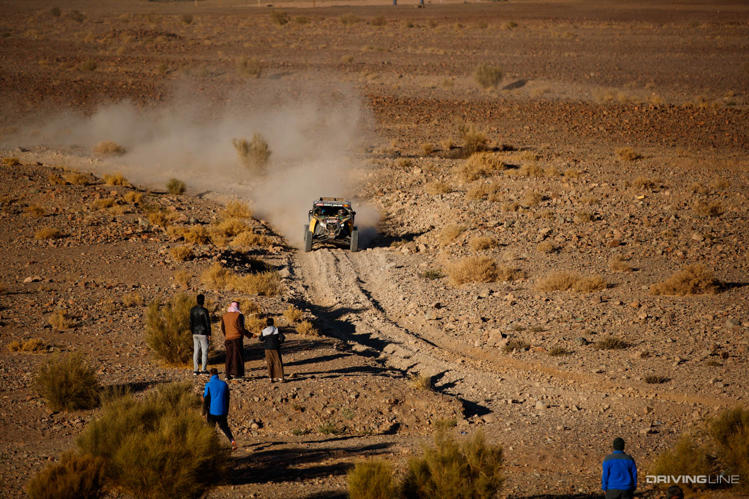 People watching Casey Currie race the Dakar rally