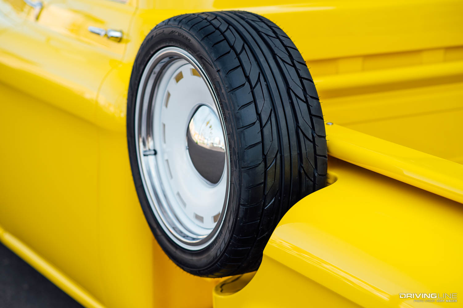 Spare Nitto NT555 G2 tire on Girl Gang Garage 1956 pickup truck