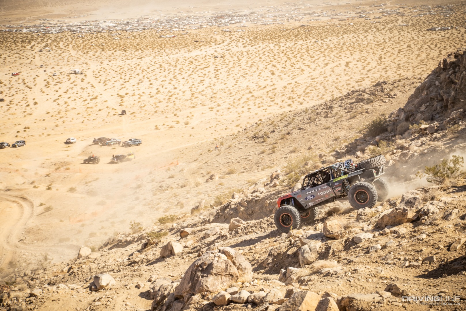 Loren Healy driving down a hill towards Hammertown