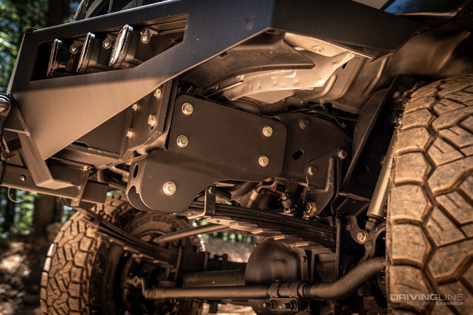 Ford E-350 4x4 Van Conversion Ujoint Offroad Leaf spring mount detail