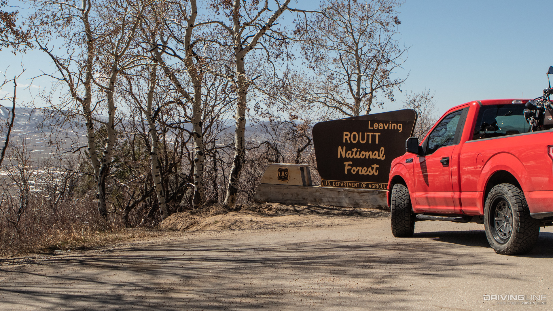 Nitto Recon Grappler tires on F150 at Routt National Forest sign