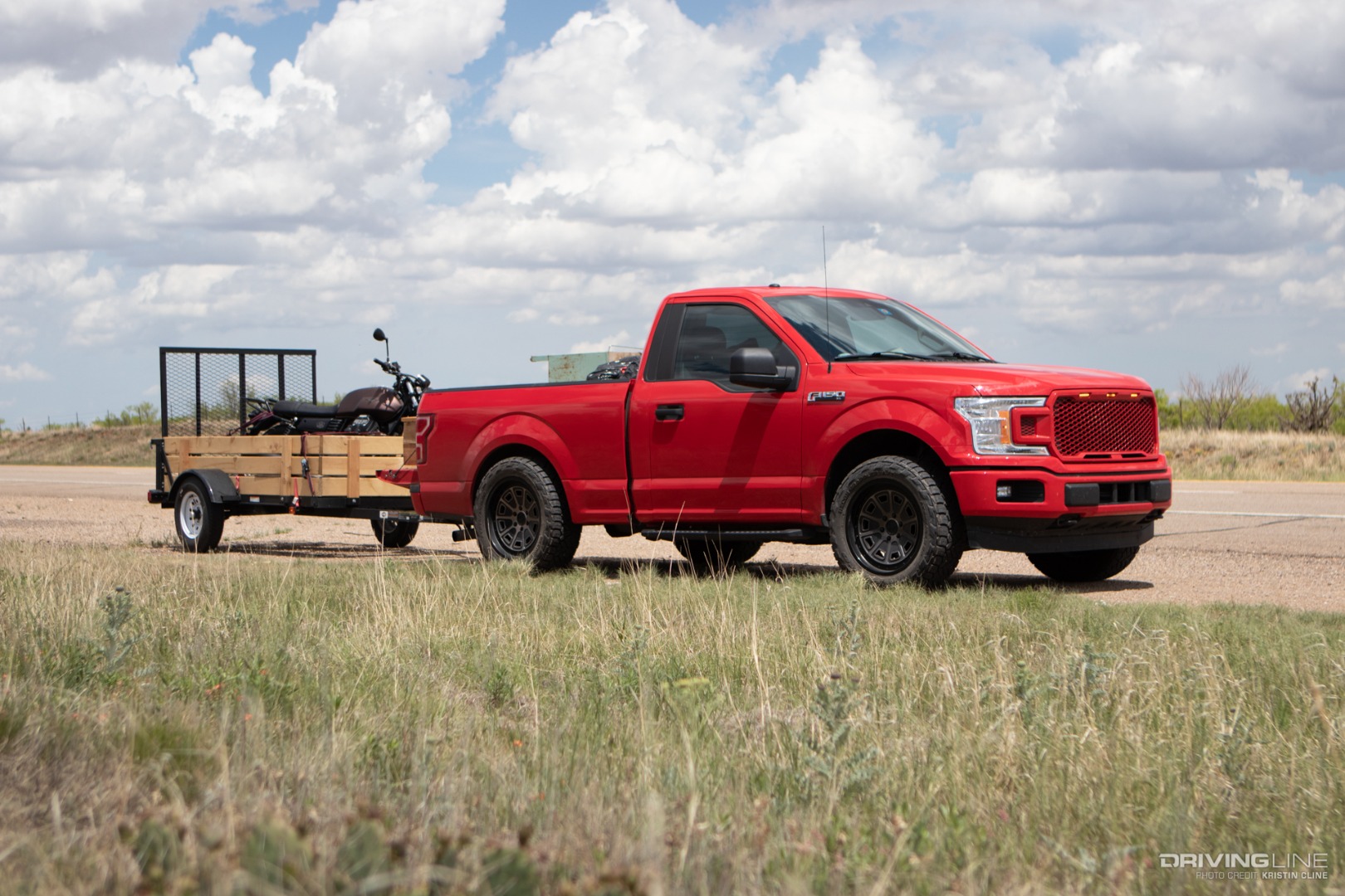 Nitto Recon Grappler A/T Tires on Ford F150 towing a trailer with a motorcycle