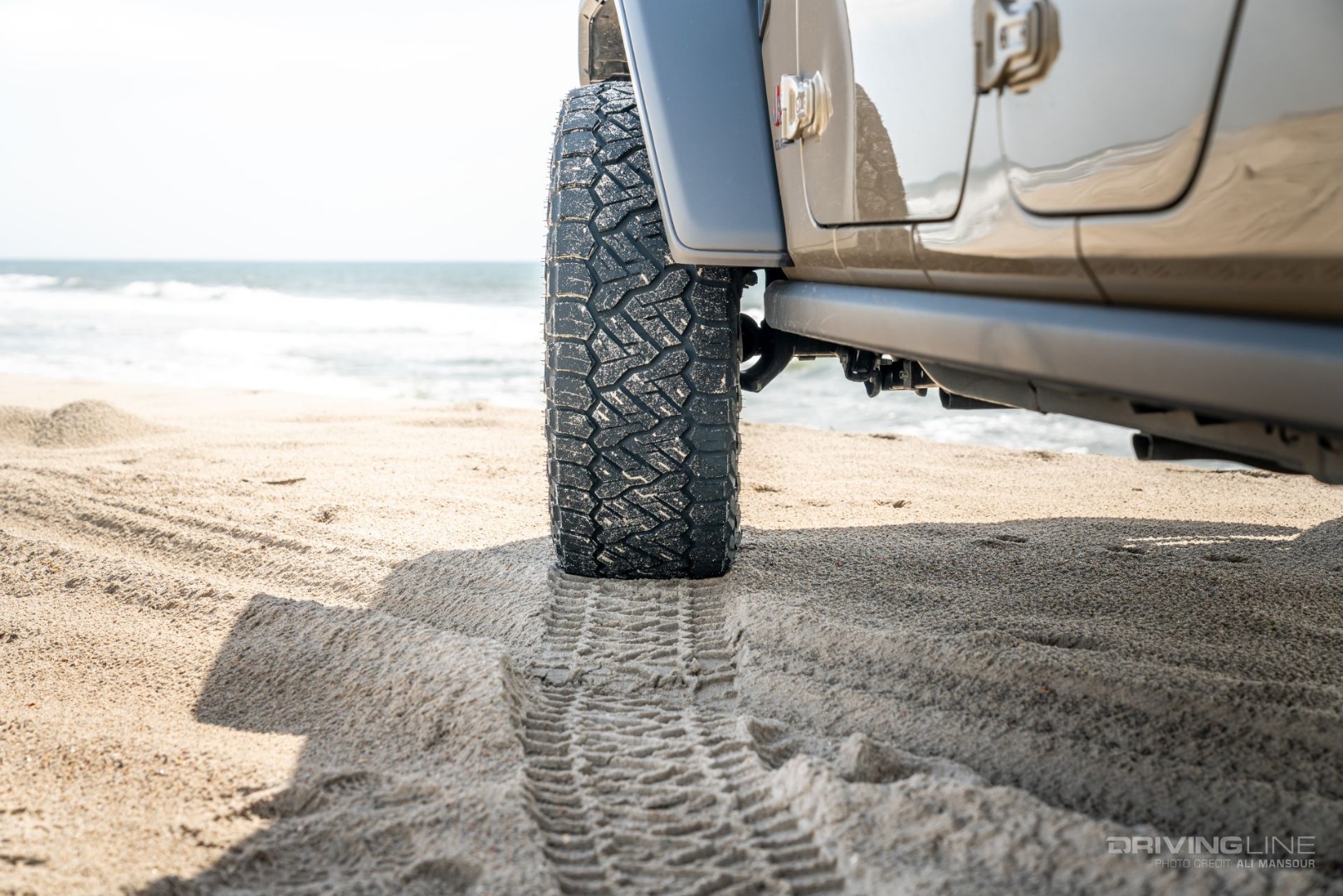 nitto tire recon grappler a/t on a sandy beach