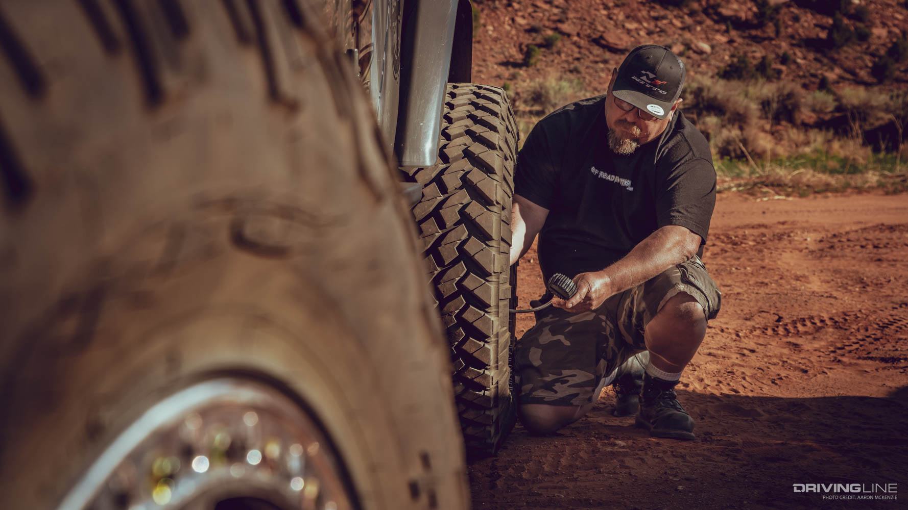 Mel Wade airing down Nitto Trail Grappler tires before hitting a trail