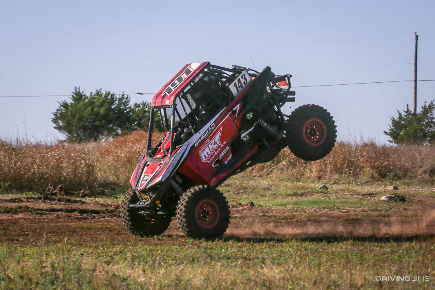a UTV coming down on its front wheels