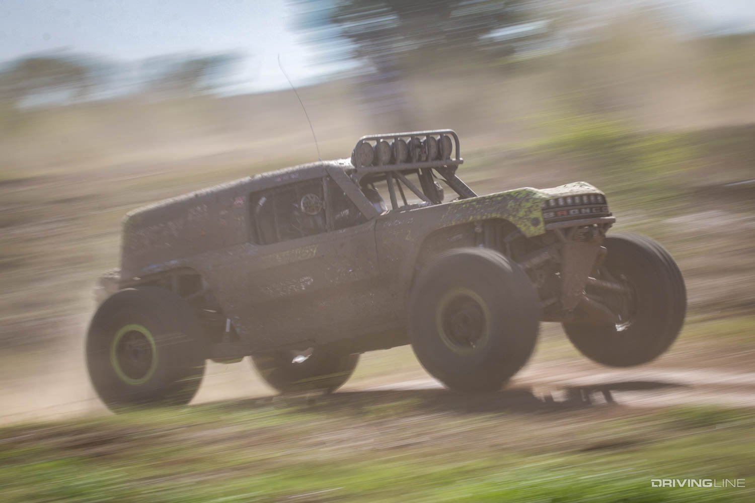 Vaughn Gittin Jr. driving up a small hill