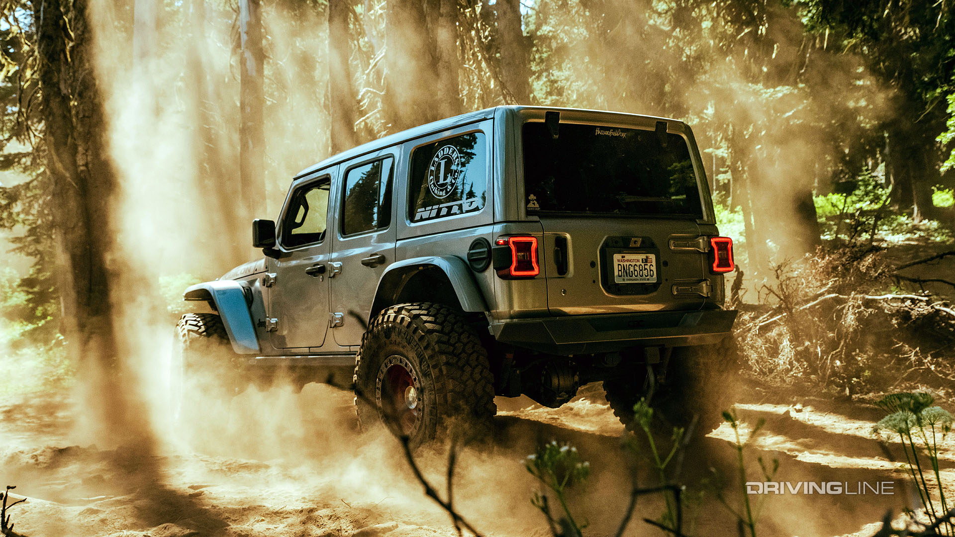 jeep in sunlight and forest off-roading