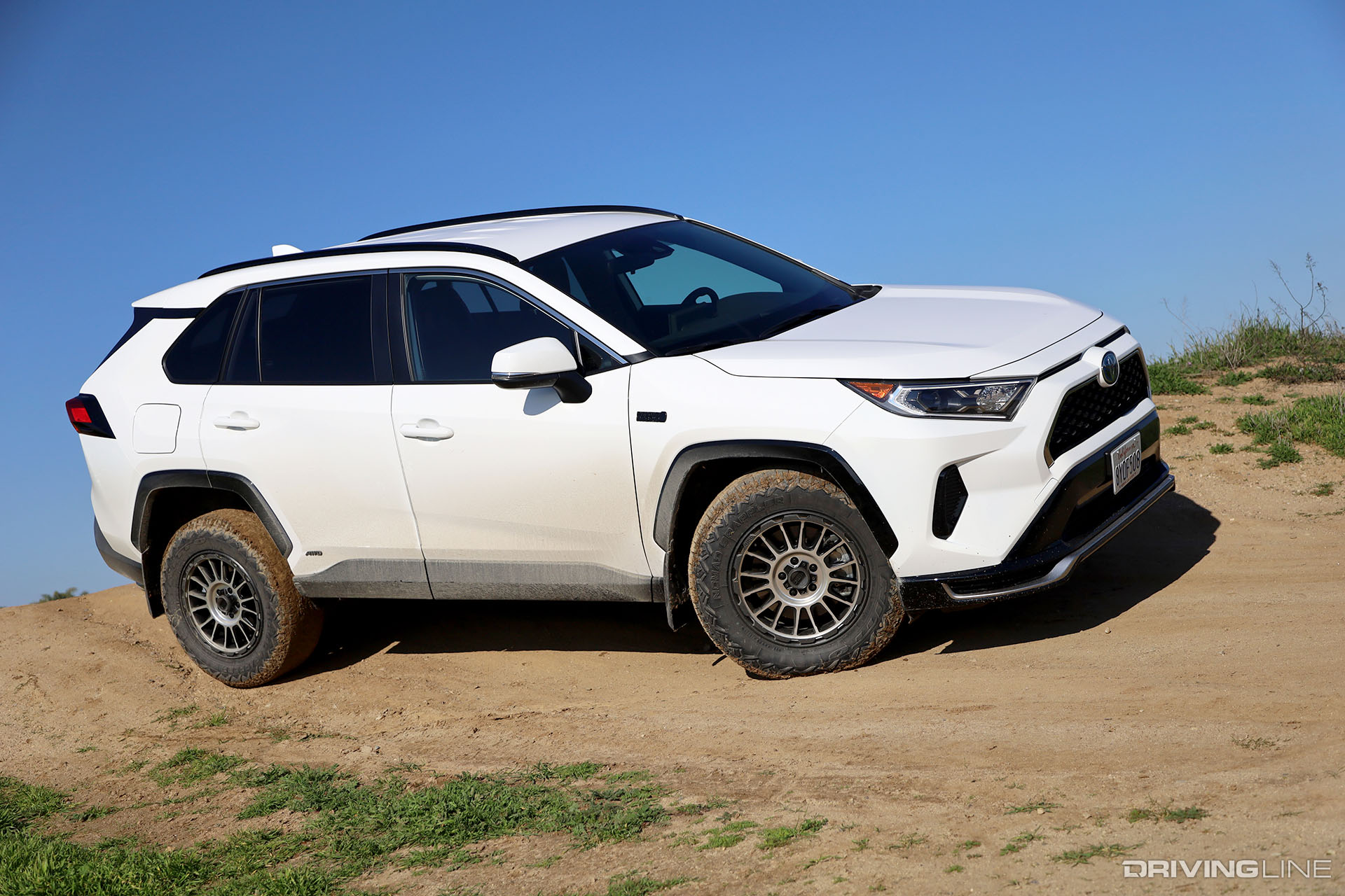 Toyota RAV4 Prime on Nitto Nomad Grappler KMC Impact Wheels