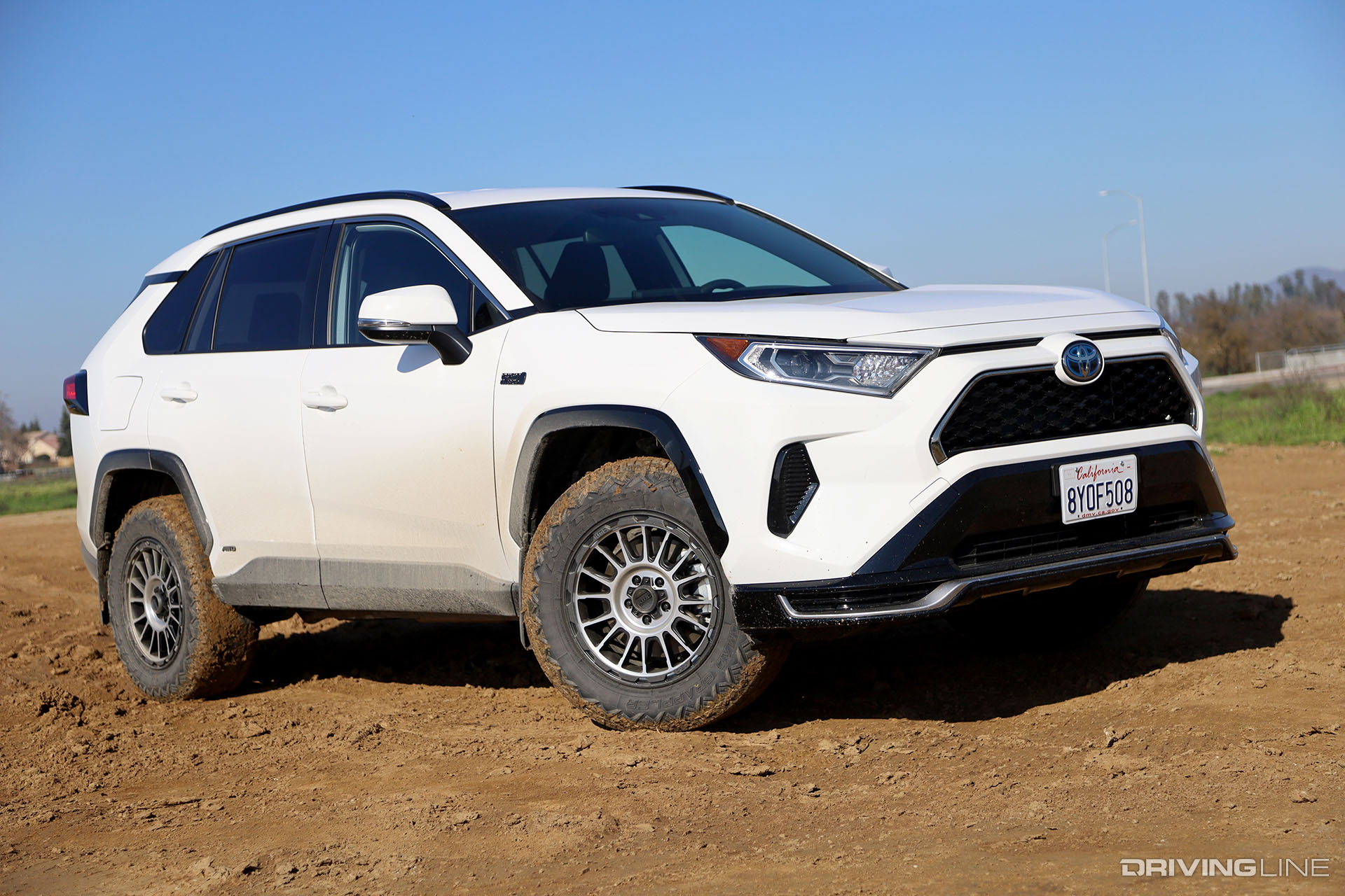 Toyota RAV4 Prime on Nitto Nomad Grappler KMC Impact