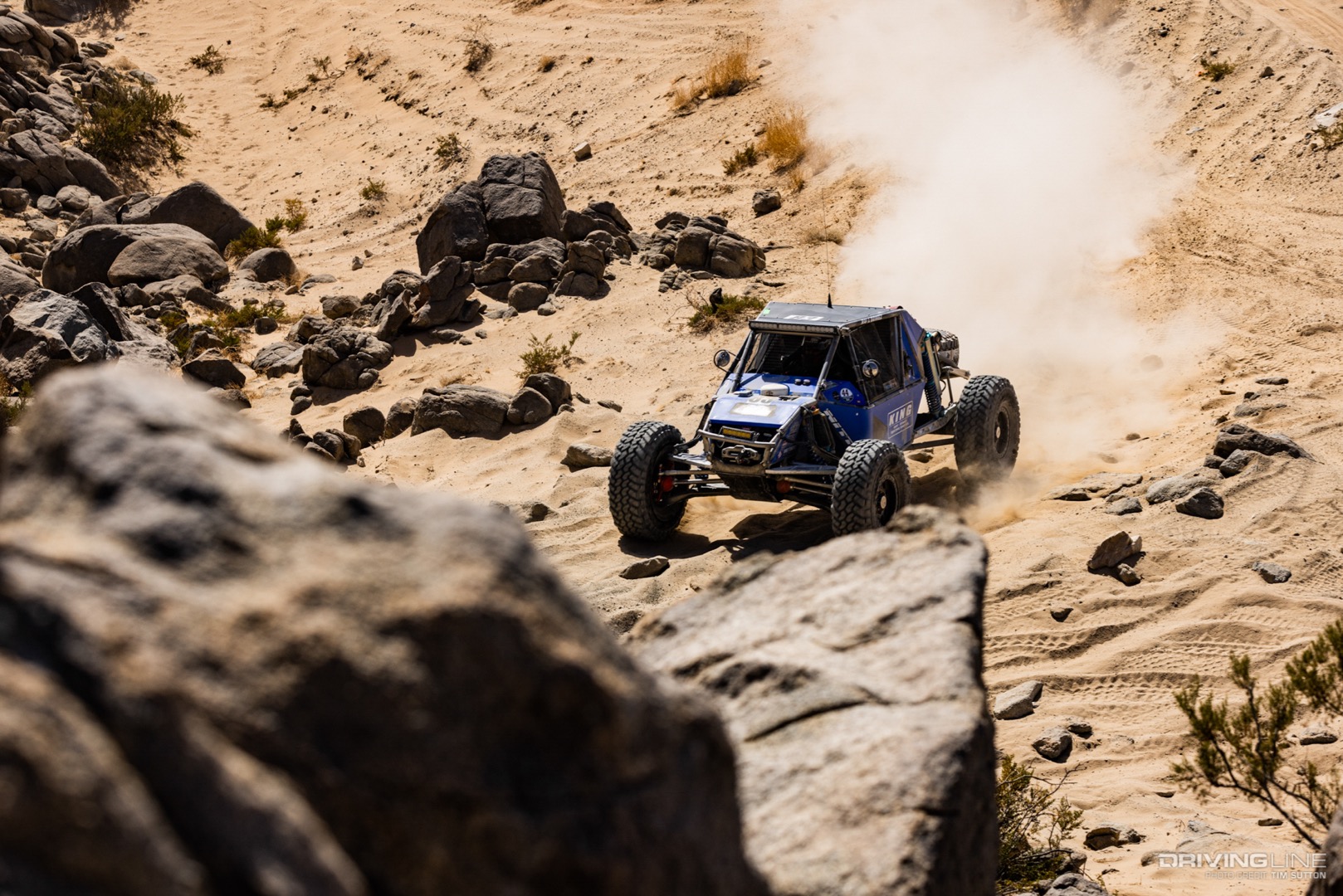 Raul Gomez driving from the desert into the rocks