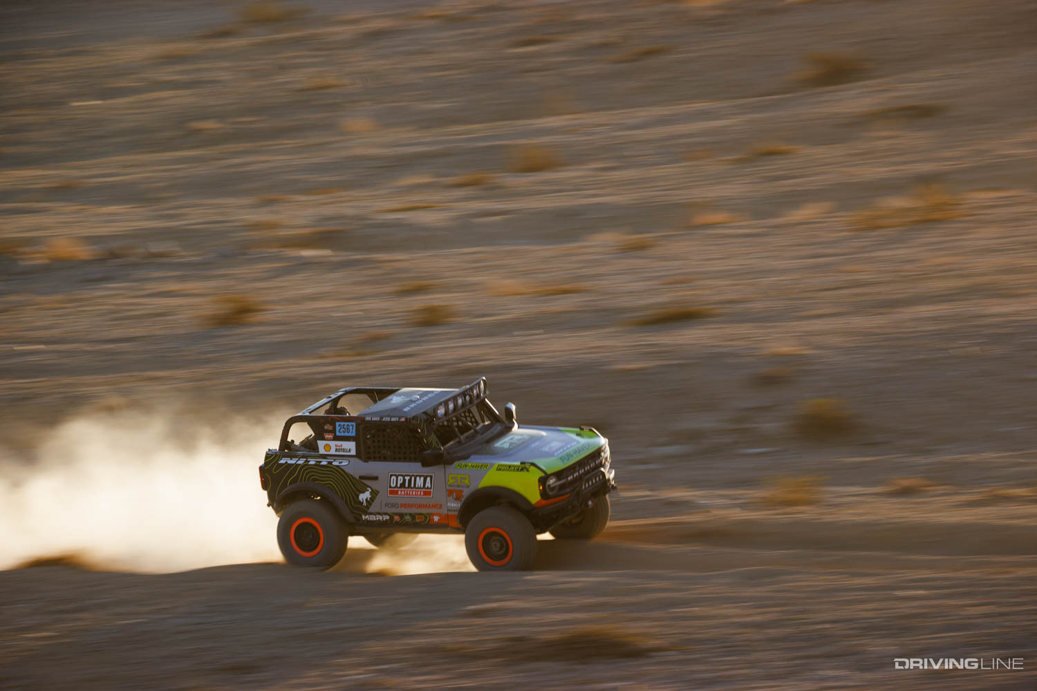 stock class Ford Bronco racing through the desert at 2022 Ultra4 King of the Hammers Every Man Challenge