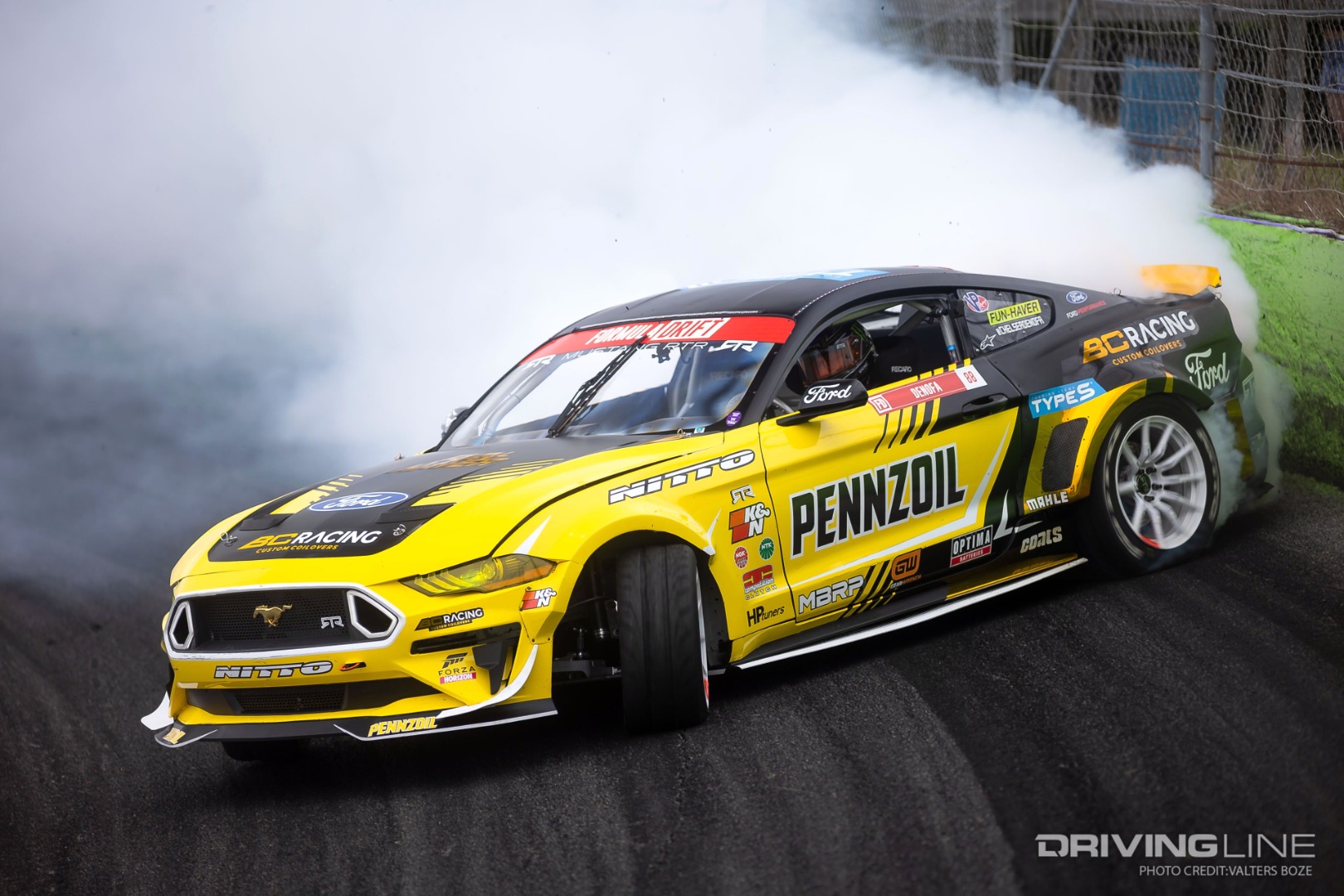 Chelsea DeNofa drifting in in his RTR Mustang with a Roush Yates built 455ci V8 engine
