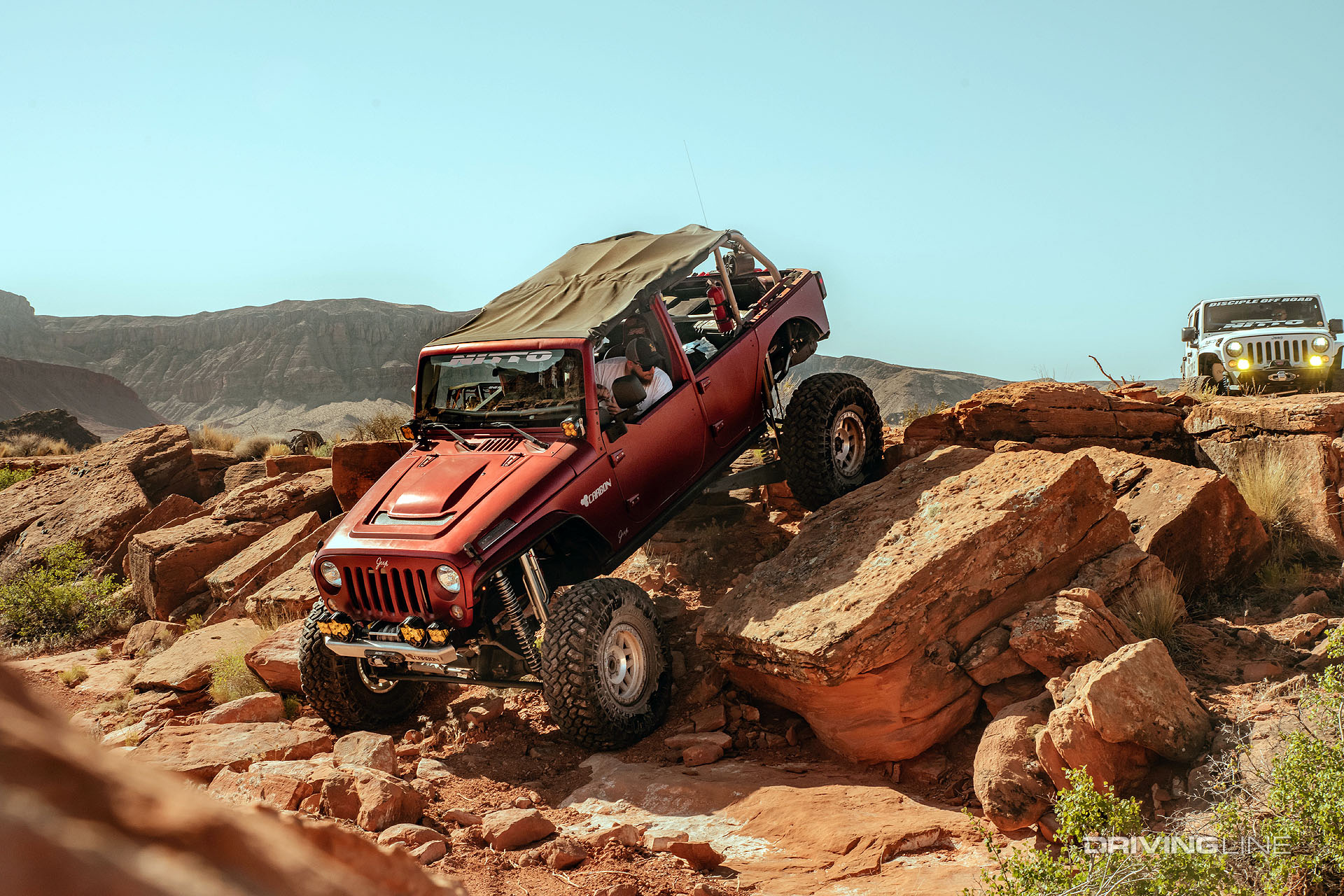 carbon off road jeep rock climbs on nitto tires