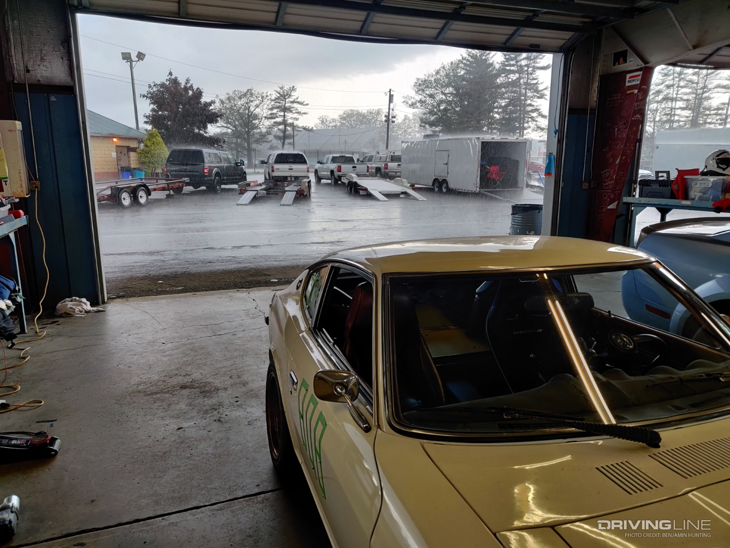 Datsun 280Z in rain in garage at WGI