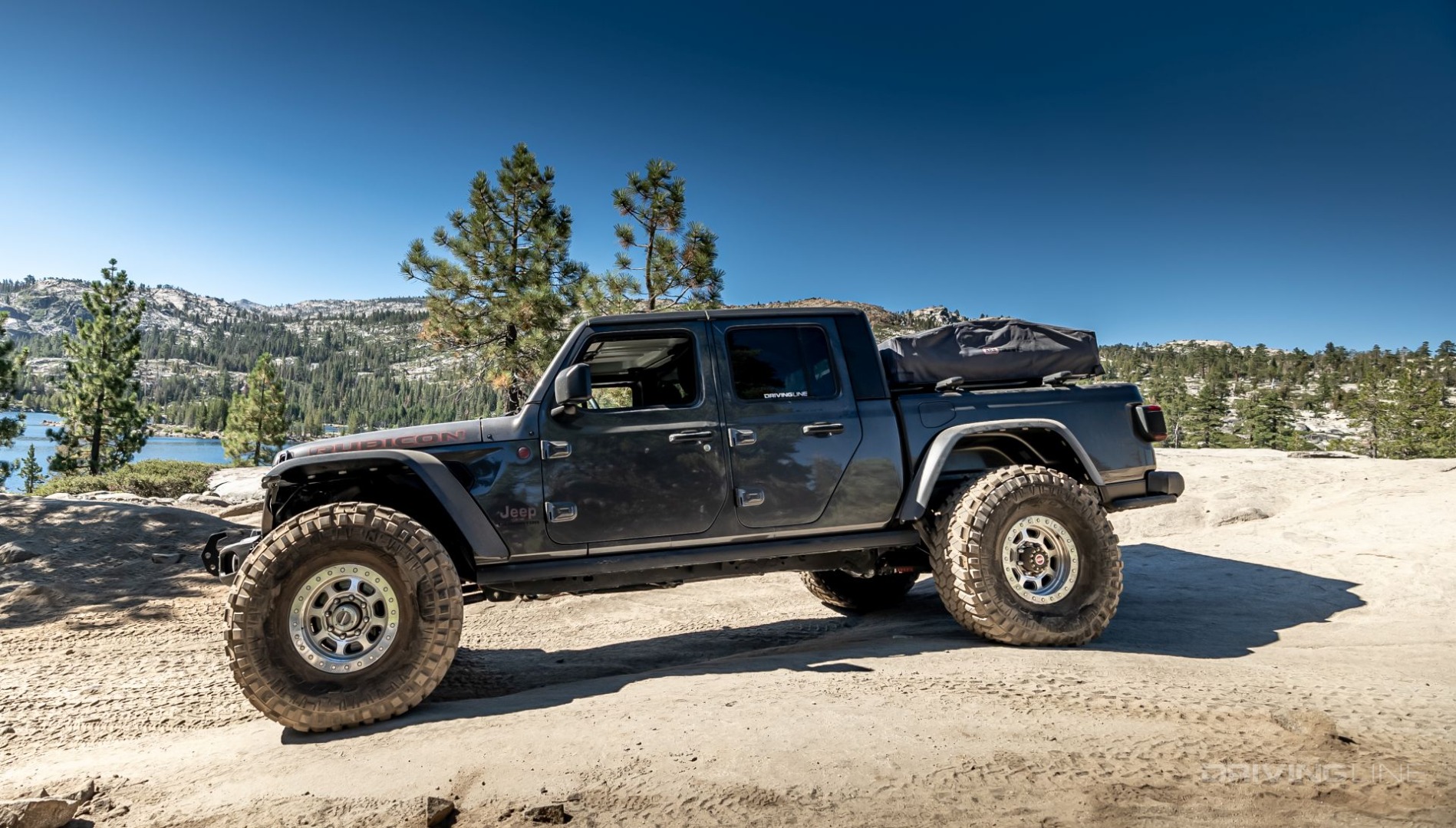 driver side view of Jeep Gladiator Rubicon Trail 40s Nitto Tire