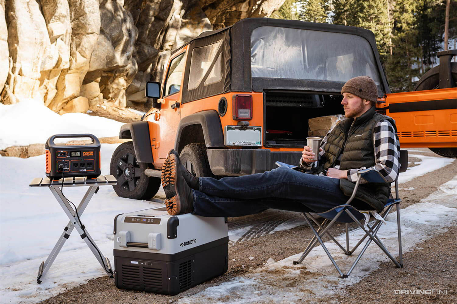 Man enjoys overlanding with his Jeep Wrangler and power generation devices