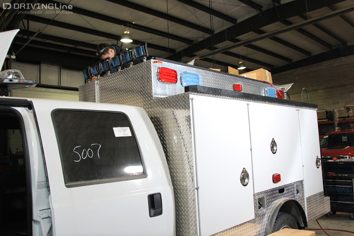 Vehicle with overland gear installed on chassis cab
