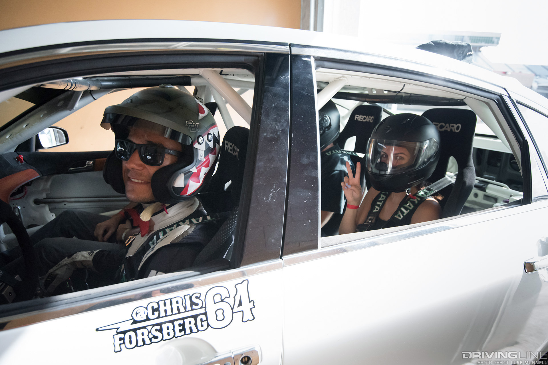 Matt Powers in Chris Forsberg's VK56-powered Infiniti with ride-along