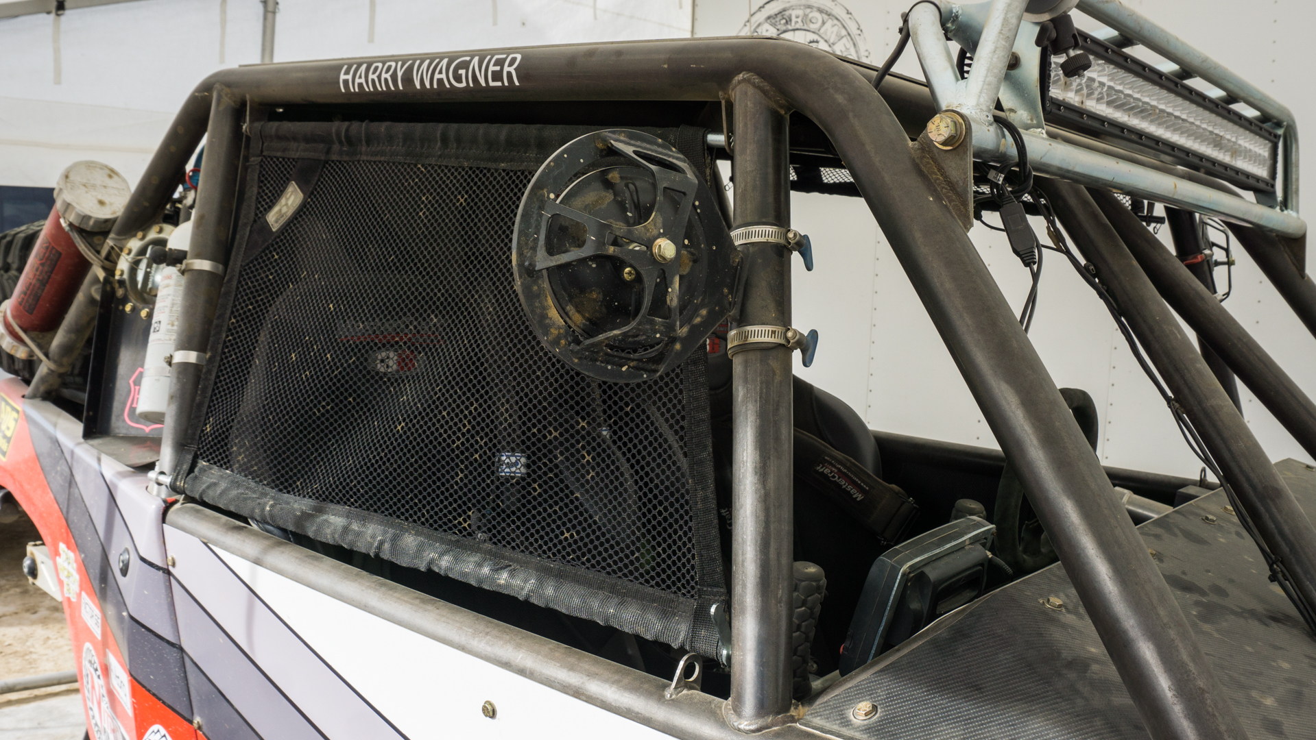 Window nets should be easy to get on and off but keep hands inside the vehicle.