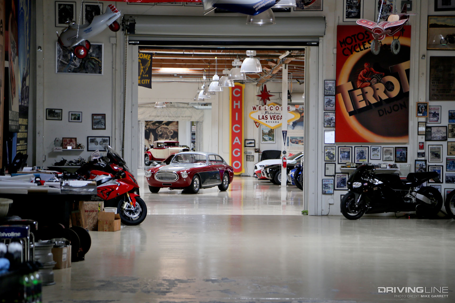 Motorcycles and cars in Jay Leno's garage