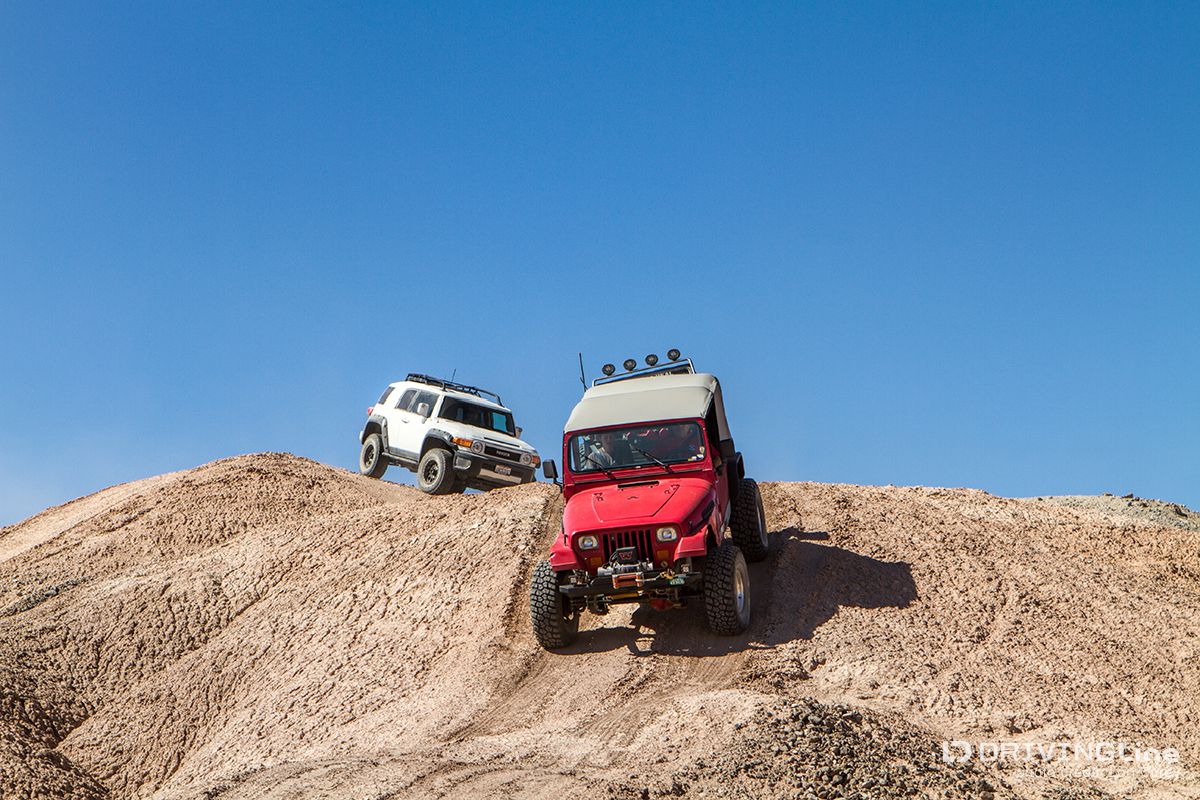 Jeep and FJ Cruiser playing on the mud hills at Ocotillo Wells OHV SRA