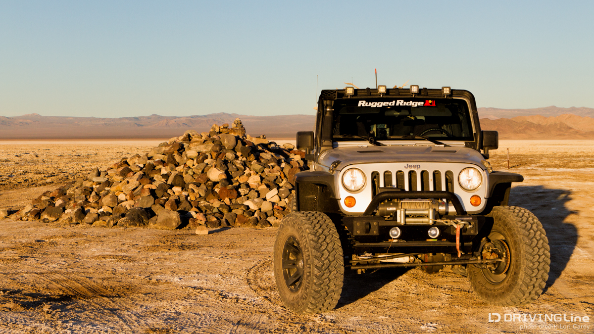Jeep at Travelers Monument on Soda Dry Lake, Mojave Road