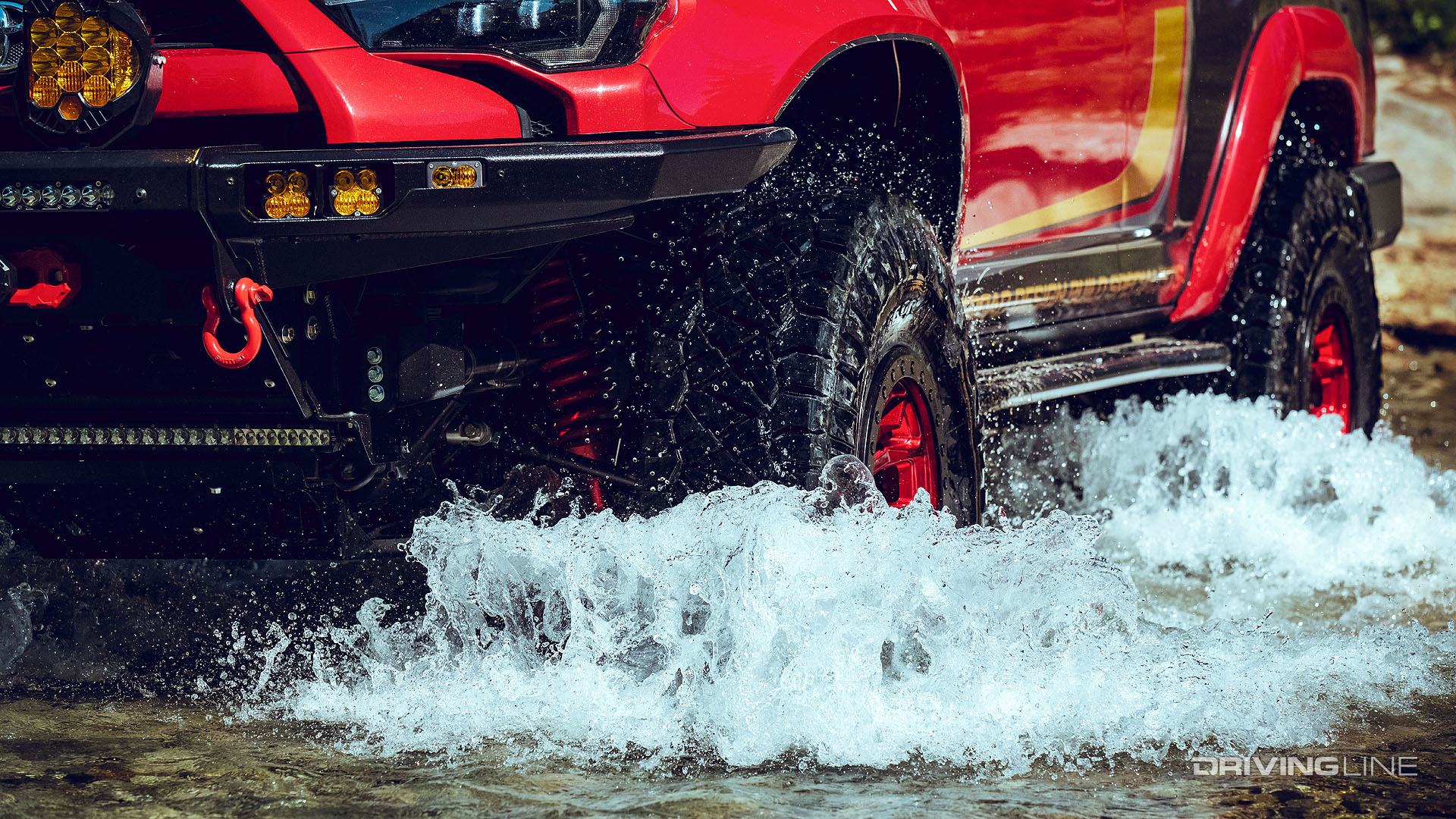 Toyota 4Runner fording water on Nittos