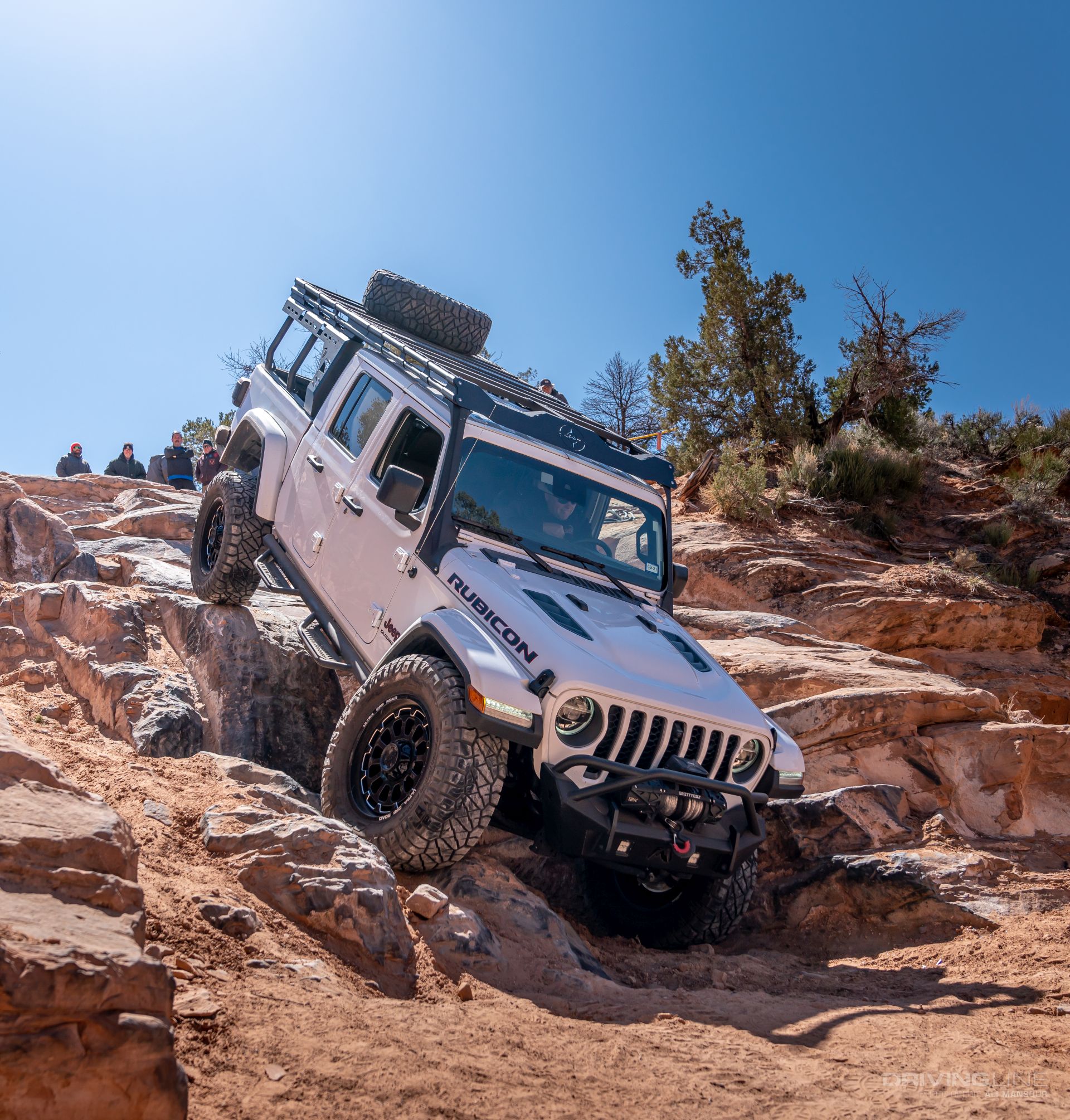 Jeep Gladiator Rubicon on Ridge Grapplers coming down high dive in Moab Utah