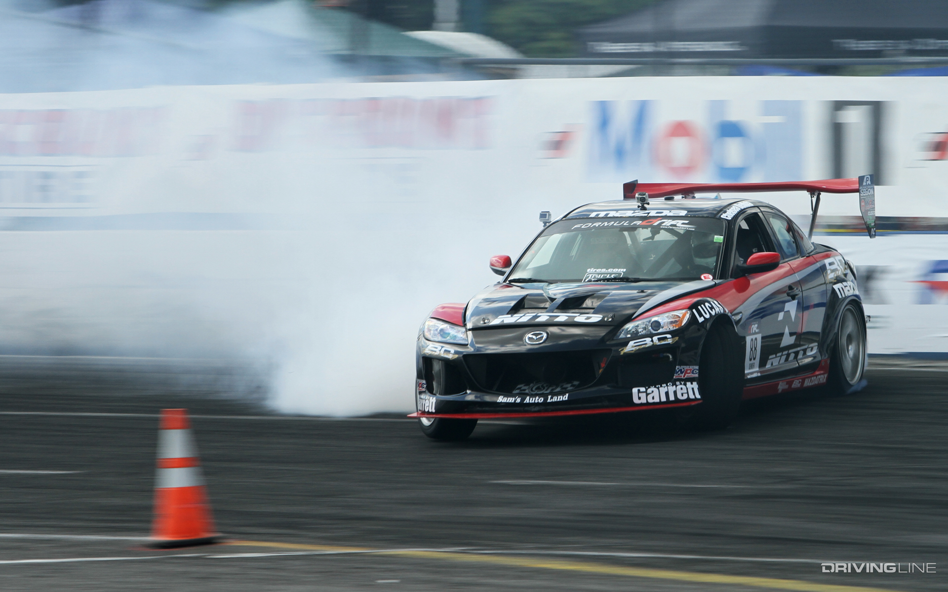 The Bergenholtz Racing Mazda RX8 pushed nearly 800whp out of the 3-rotor engine, and was piloted by several drivers including Chelsea Denofa