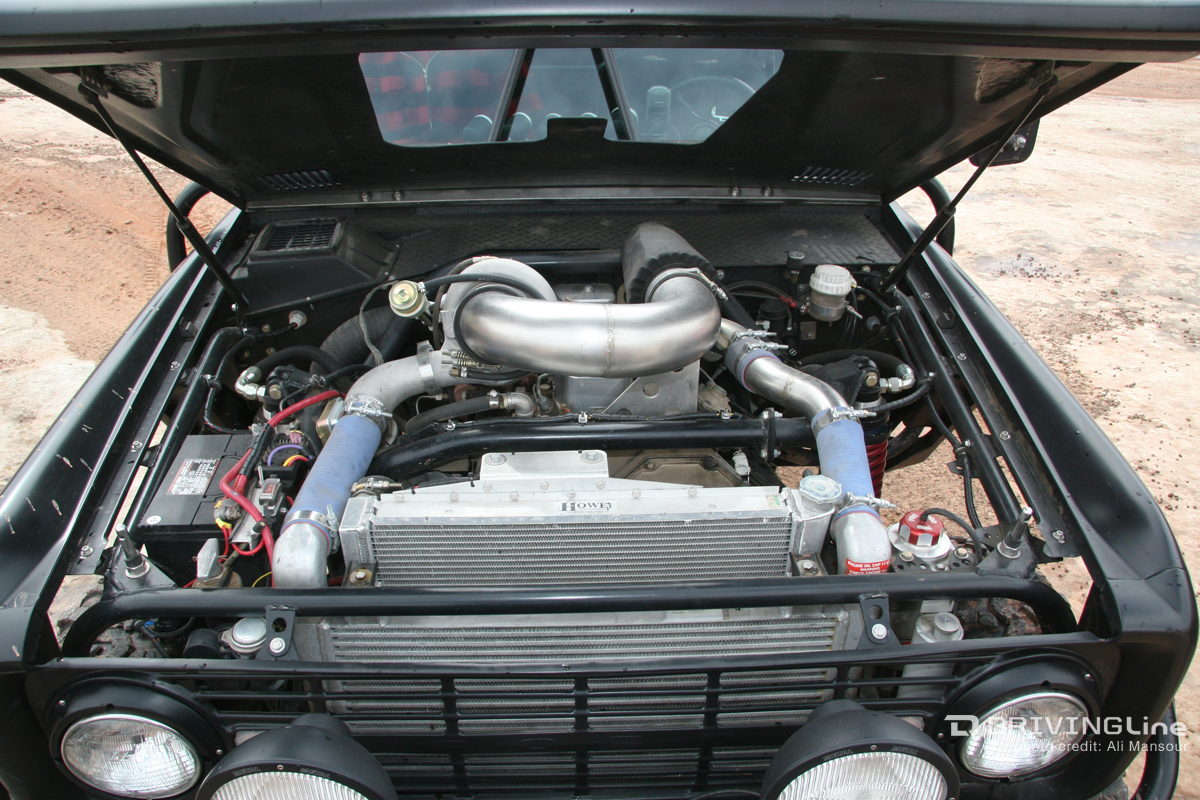 Diesel-swapped SUV engine shot with hood up