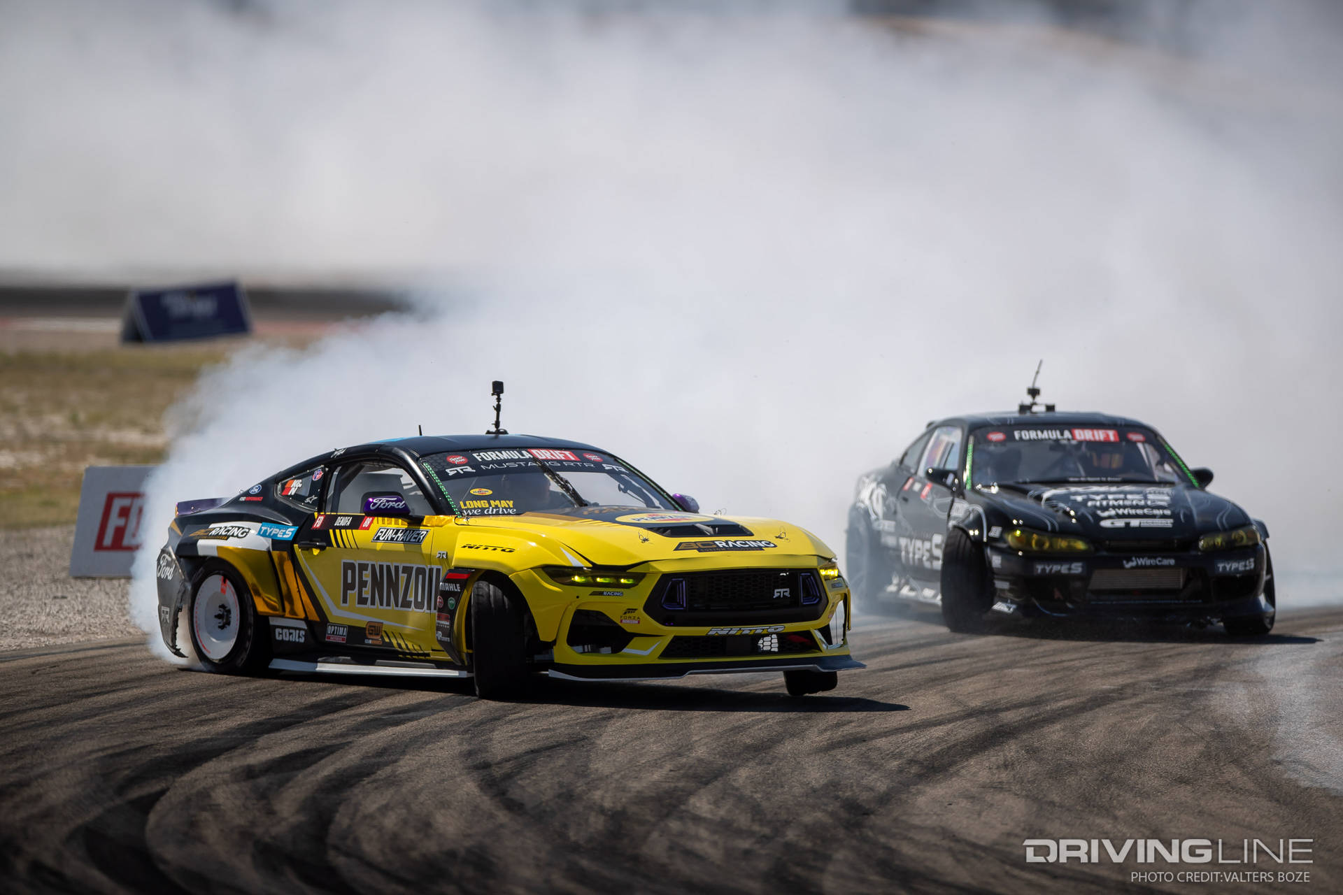 Chelsea DeNofa Tandem Drifting against mike Powers at 2023 Formula Drift Utah