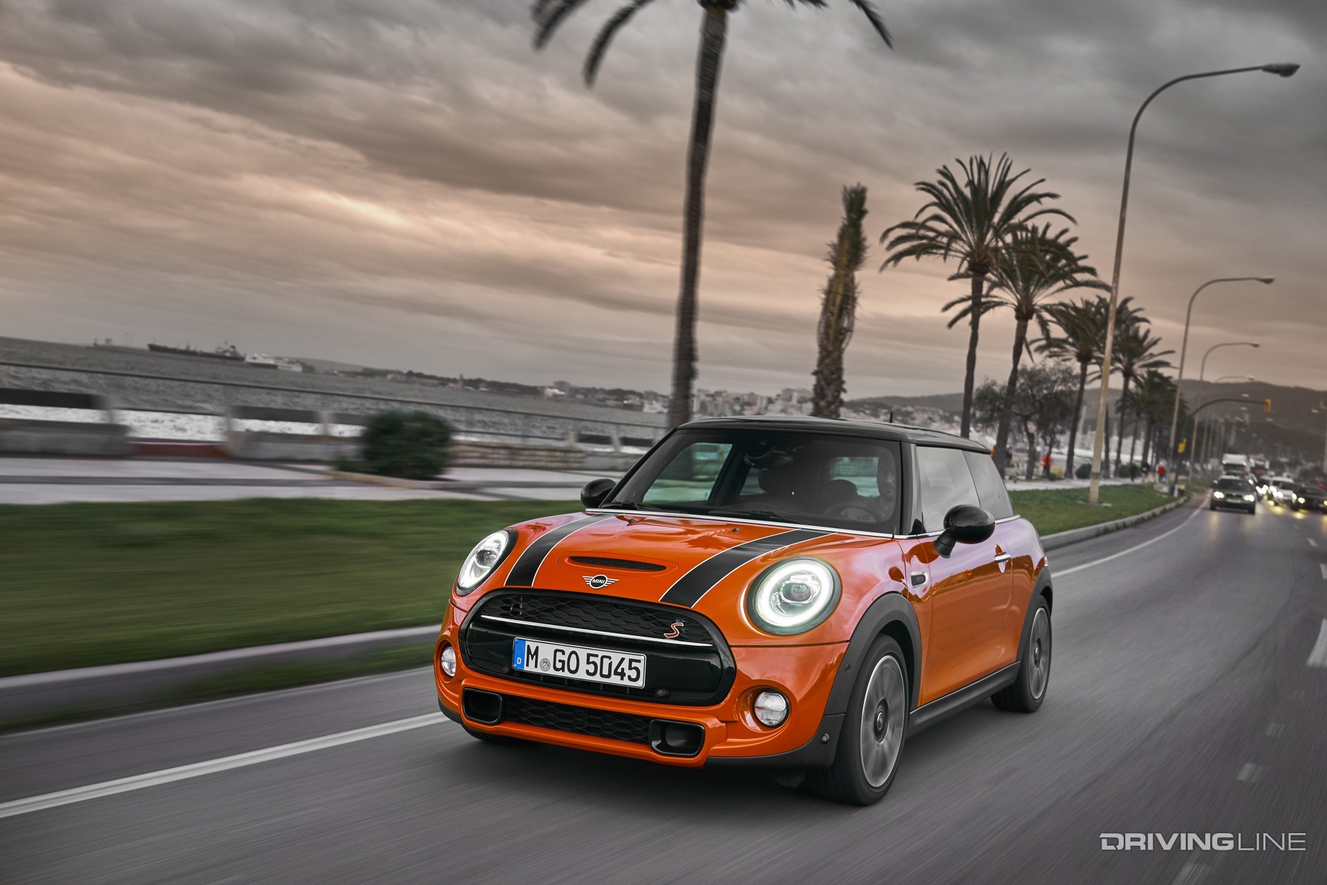 2020 Mini Cooper S front view orange on road
