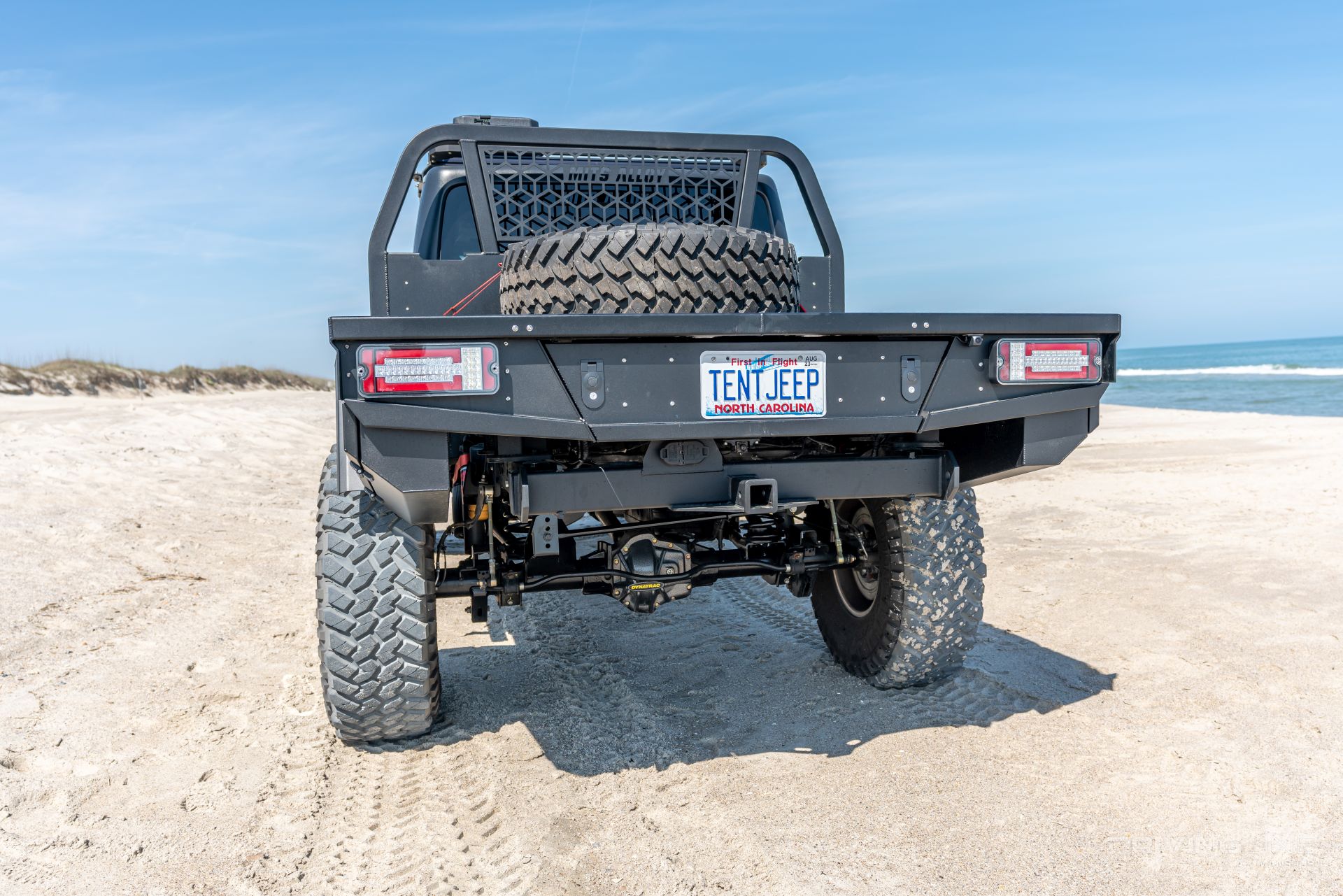 Rear view of Jeep Gladiator Rubicon on 40 Flatbed Tray Bed Conversion MITS Alloy
