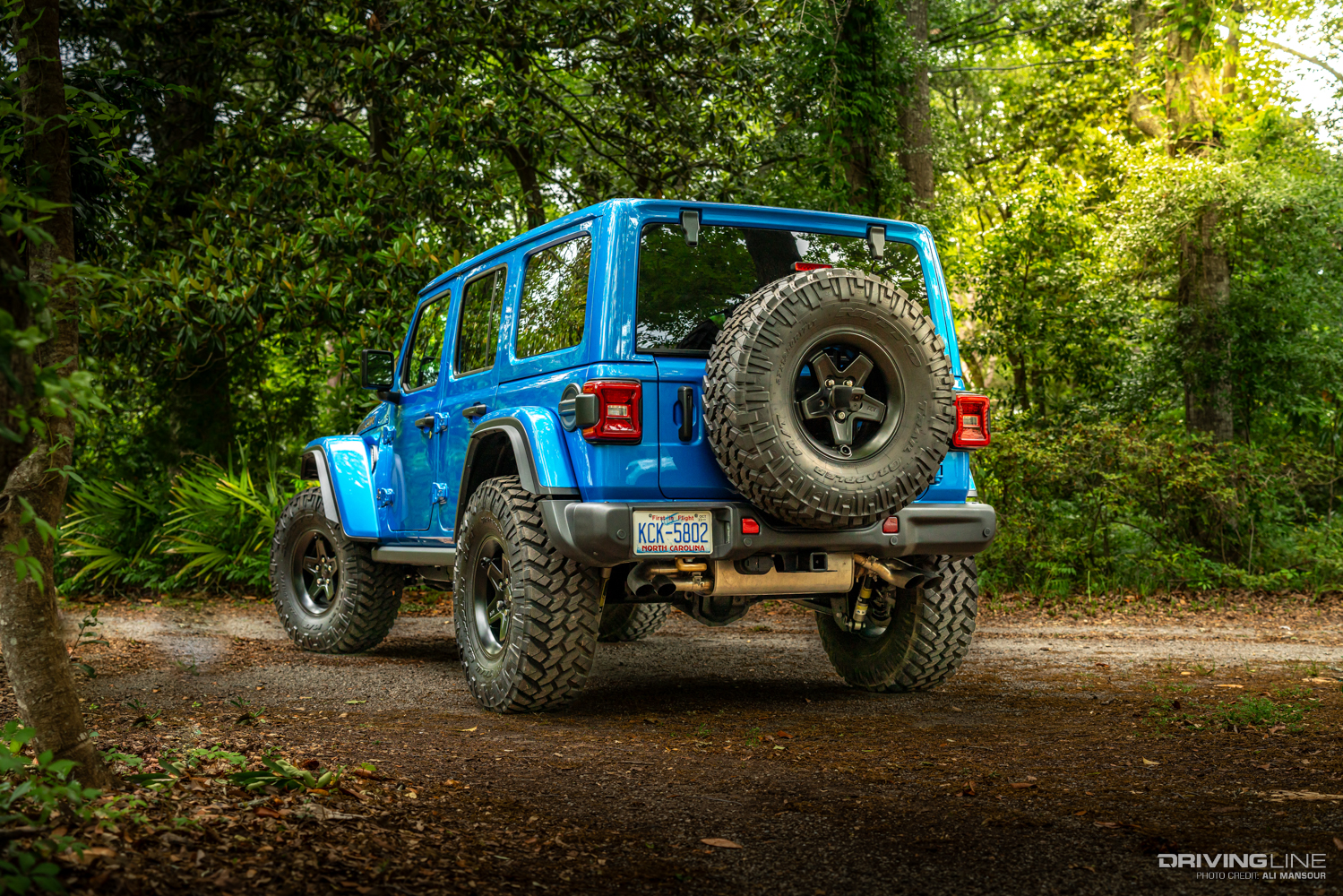 2023 Jeep Wrangler Rubicon 392 on 37s hydro blue rear shot