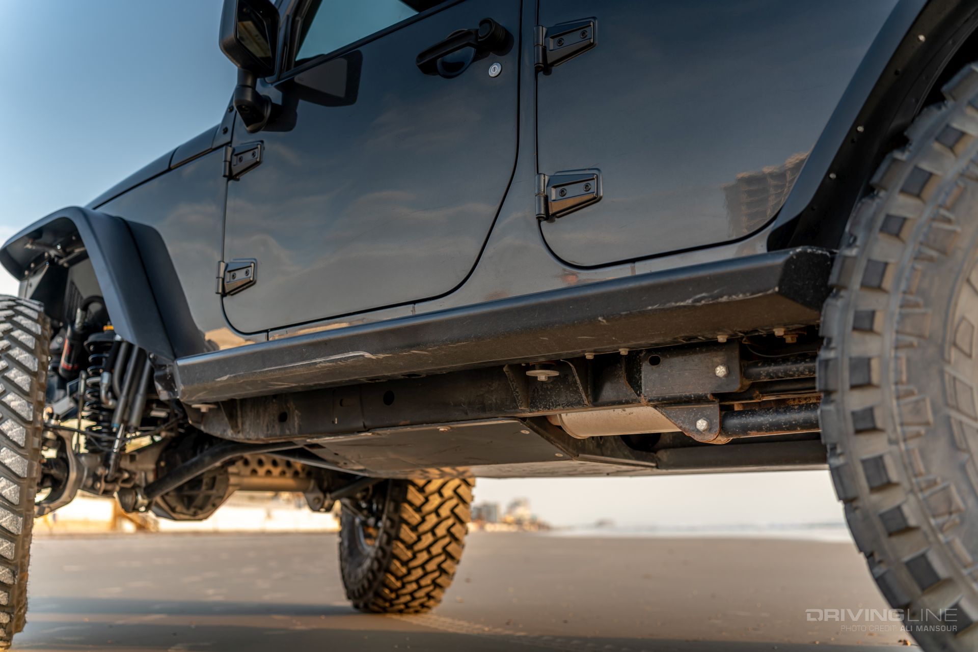Jeep Wrangler JK artec skid plates and savvy sliders side view
